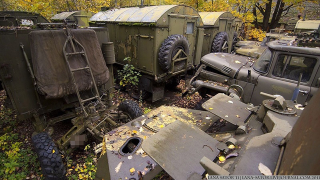 Illustration for article titled Excellent pictures of abandoned Russian military vehicles found in the woods